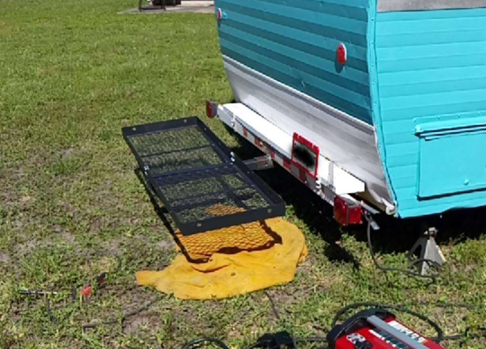 Additional storage rack welded to the back of the camper